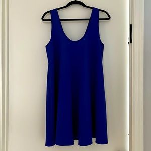 Large Soprano royal blue dress with tie back and silver detail in the back.